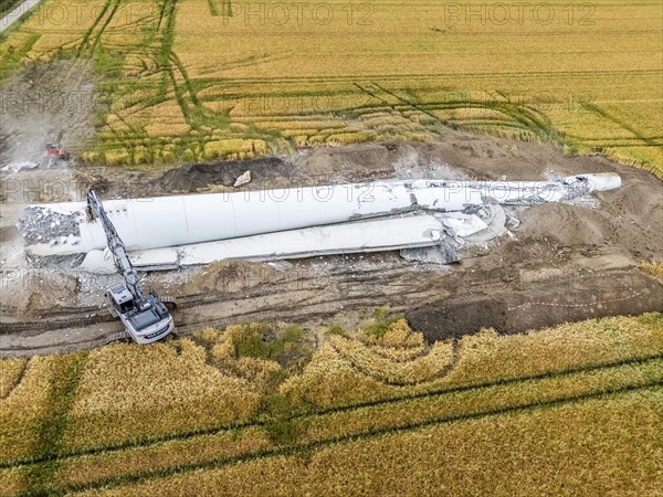 Demolished tower of a 20 year old wind turbine, in the Werl wind farm, 5 old Enercon E-66 turbines