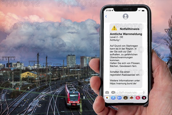 Symbolic image Cell Broadcast, warning service via mobile phone, by SMS, to all devices located in