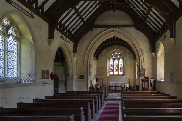 Nave chancel arch altar east window inside village parish church of Saint Mary, Boyton, Suffolk,