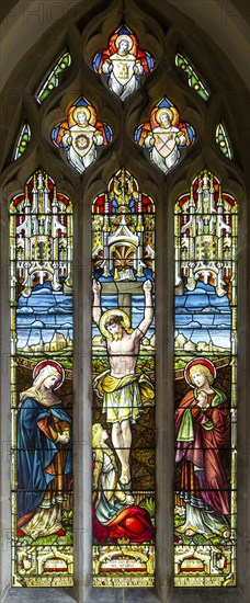 Stained glass window of Crucifixion church of Saint George, Ogbourne St George, Wiltshire, England,