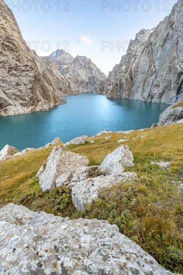 Turquoise mountain lake Kol Suu with rocky steep mountains, Kol Suu Lake, Sary Beles Mountains,