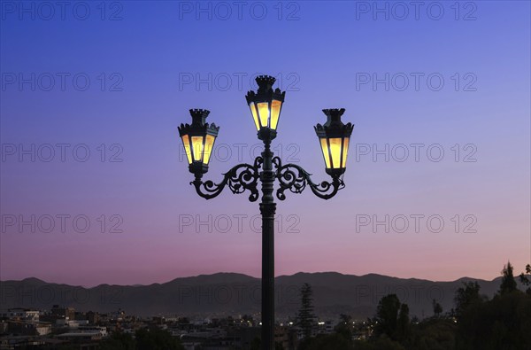 Arequipa, Peru. Sunset view of the Misti Volcano mountain range from the Yanahuara bridge