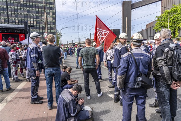 Steelworkers at a demonstration in front of the headquarters of ThyssenKrupp Steel Europe in