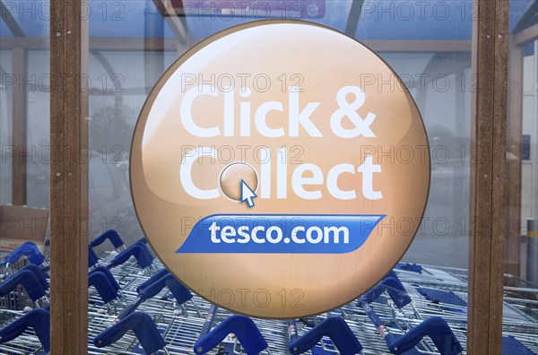 Click and Collect Tesco sign close up, UK