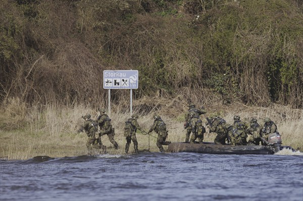 Soldiers on an inflatable boat, taken as part of the military exercise 'Wettiner Schwert' with