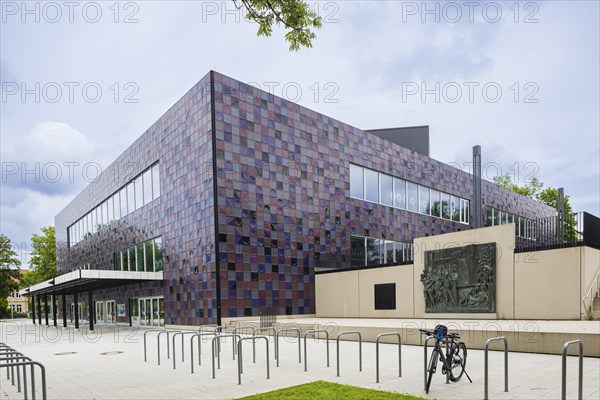 Göttingen City Hall, also known as the tiled stove. Relief The City by Jürgen Weber (1928-2007),
