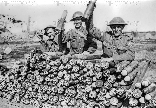 1917 British WWI artillery soldiers posing with field gun shells during World War One at Zillebeke,