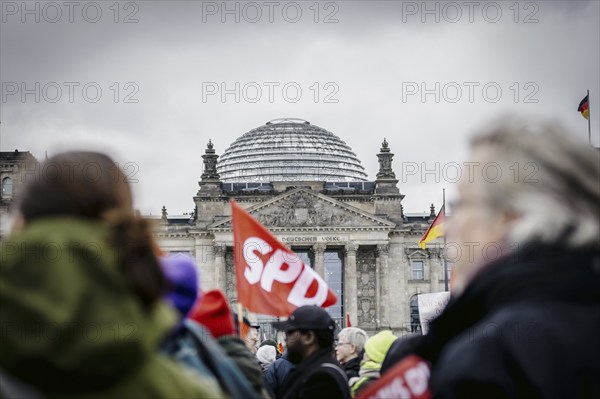SPD flag in front of the Reichstag building. Taken at the large demonstration against the right in