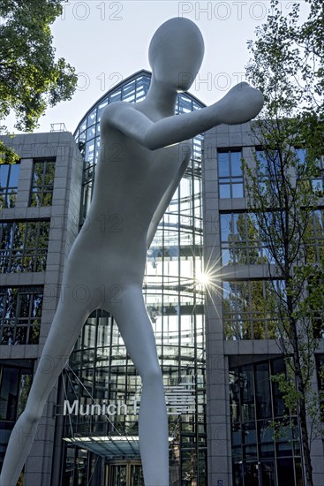 Walking Man, monumental sculpture by Jonathan Borofsky made of steel and plastic, pedestrian,