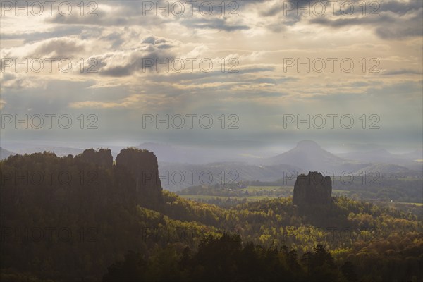 View of the Schrammstein chain, the Falkenstein and the Lilienstein from the Carolafelsen, Bad
