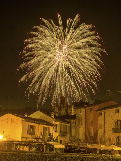 Fireworks from the Scaliger castle in the foreground Houses of, Borghetto, Valeggio sul Mincio,