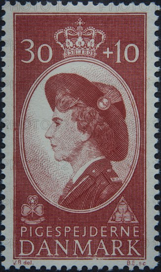 Queen Ingrid of Denmark (1910-2000), portrait in Girl Scout uniform on Danish postage stamp