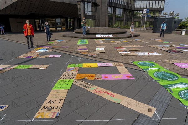 Friday For Future activists with the action, Your sign strikes for you, collected protest signs are