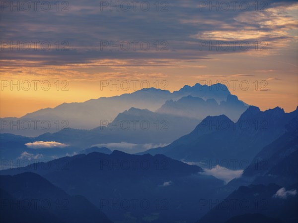 Silhouette of the Hoher Dachstein in the haze at dawn, Roßfeld, Golling, Salzburg province,