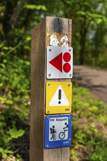 Signpost on the Brammentrail, mountain bike trail on the Schurenbach spoil tip, in Essen North