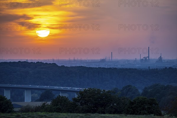 Sunset over the western Ruhr area, Ruhr valley bridge of the A52 motorway between Essen and