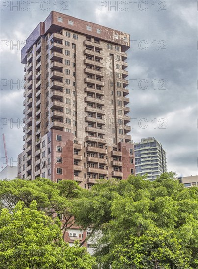 Red-brown building in the center of Kuala Lumpur, Malaysia, Asia