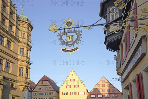Renaissance town hall and half-timbered house Marien-Apotheke with nose sign on the market square,
