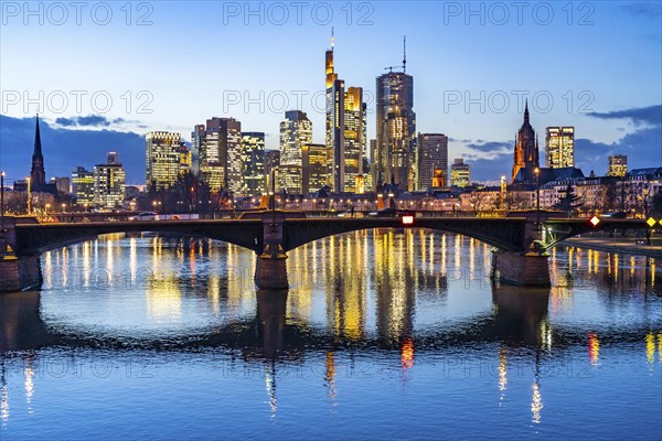 Skyline of the city centre of Frankfurt am Main, river Main, dusk, Ignatz-Bubis-Brücke, Hesse,