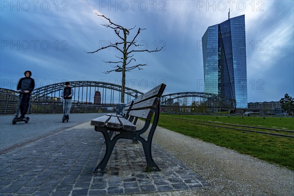 Building of the European Central Bank, ECB, on the Main in Frankfurt, park bench on the banks of