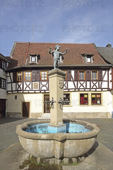 Fountain with sculpture of a boy by Emil Cauer 1938, putto with two bird figures holding hands,