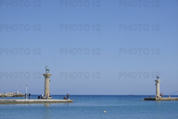 Elafos and Elafina, stag and hind, sculptures on columns, harbour entrance Mandraki harbour,