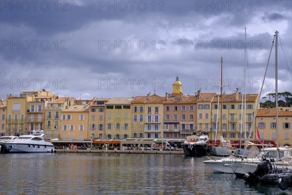 Dark clouds over the harbour of Saint Tropez, Var, French Riviera, Provence-Alpes-Cote d'Azur, Cote