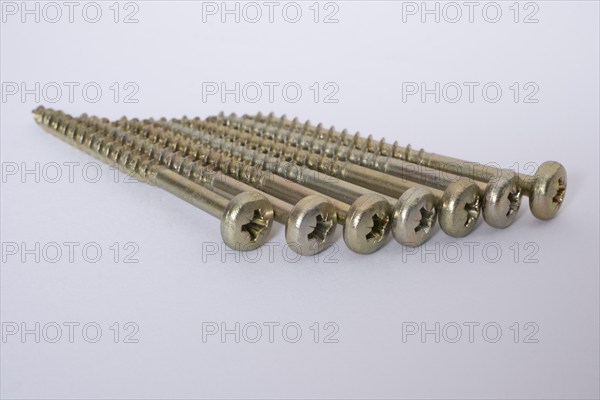 Phillips screws on a white background, wood screws