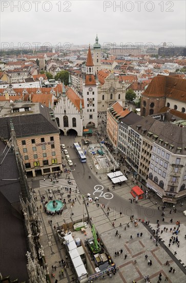 High angle view of buildings with traditional terracotta ceramic tiled rooftops surrounding the