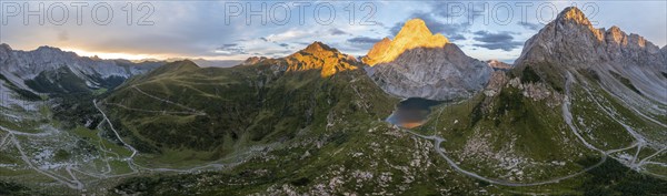 Alpine panorama, Hohe Warte and Wolayersee, sunset in the mountains, aerial view, Carnic Alps,