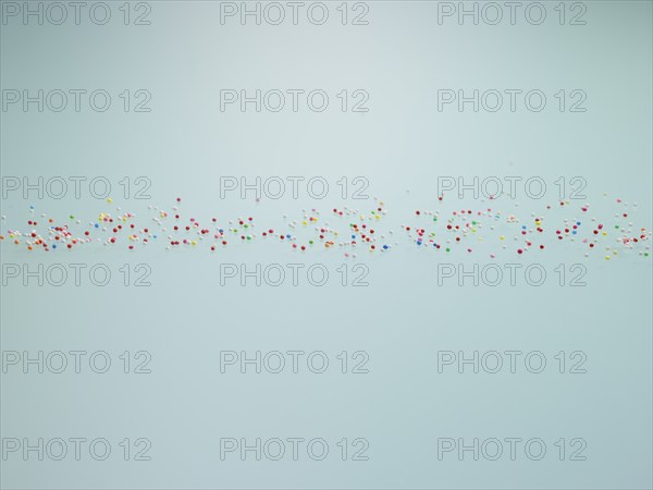 Colourful nonpareils, sugar pearls, sprinkle decorations in bright colours, mini sugar balls for