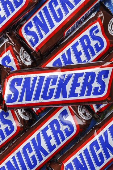Snickers bar chocolate bar from Mars Inc. as background
