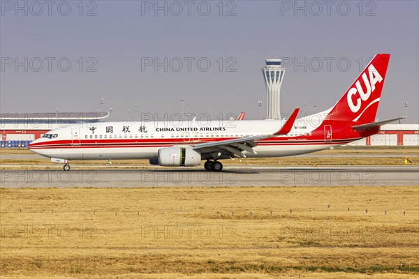 A Boeing 737-800 aircraft of China United Airlines CUA with the registration number B-1148 at