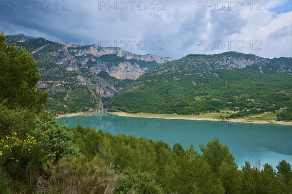 Mountain landscape with the Lac de Sainte-Croix reservoir and tree-covered slopes, summer, Lac de