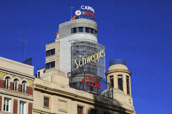 Buildings neon advert signs on Callao plaza square in Madrid city centre, Spain, Europe