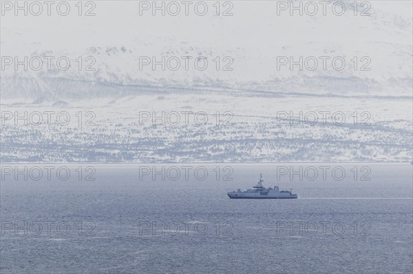 A naval vessel moored in a fjord as part of the NATO exercise Nordic Response near Tromso, 09.03