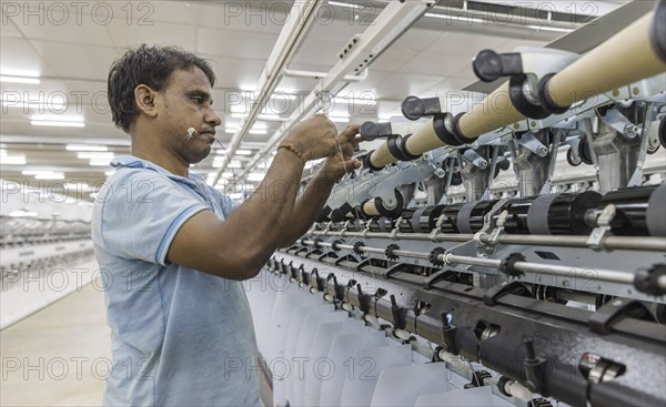 BENIN TEXTILE CORPORATION BENIN. processing cotton in a spinning mill factory near Cotonou in