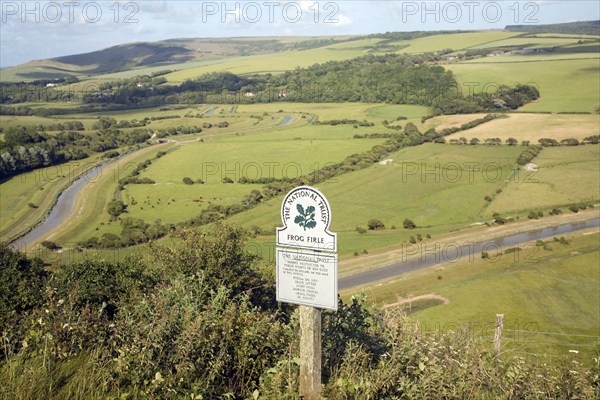 Shallow depth of field Frog Firle National Trust sign, High and Over, near Alfriston, east Sussex,