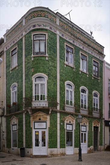 Green house with azulejos, tiles, Praça Luís de Camões square, historic centre, Lagos, Algarve,