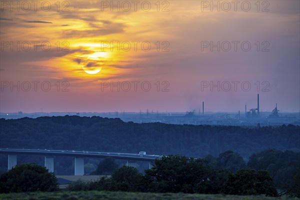Sunset over the western Ruhr area, Ruhr valley bridge of the A52 motorway between Essen and