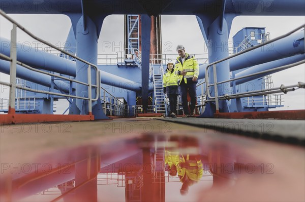 (R-L) Patrick Krawutschke, Managing Director of Container Terminal Altenwerder, and Annalena