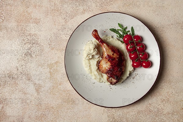 Fried duck shank, cauliflower puree, cherry tomatoes, homemade, no people
