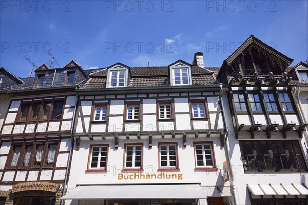 Library and barbershop on Marktstraße in Bad Münstereifel, Eifel, Euskirchen district, North