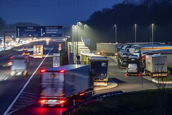 Heavy traffic on the A2 at the Schwarze Heide rest area, Bottrop, overcrowded car park for trucks