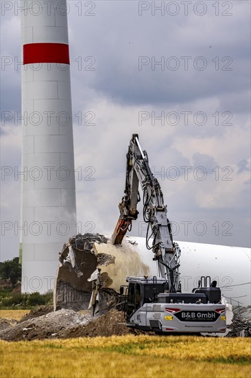 Demolished tower of a 20 year old wind turbine, in the Werl wind farm, 5 old Enercon E-66 turbines