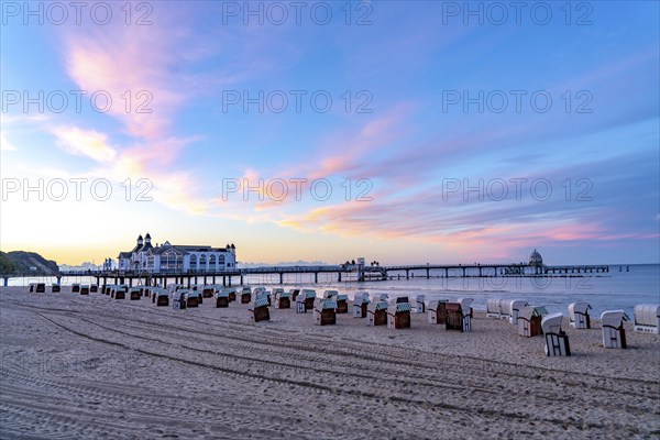 The pier of Sellin, evening mood, sunset, 394 metres long, with restaurant, jetty, beach chairs,