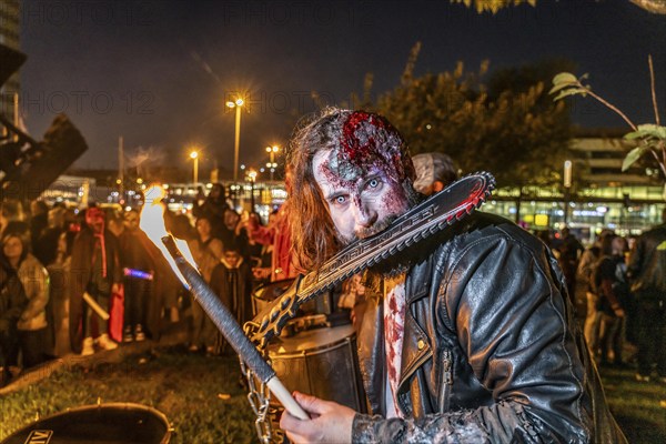 The Zombiewalk in Essen, on Halloween several hundred people, some dressed as scary zombies,