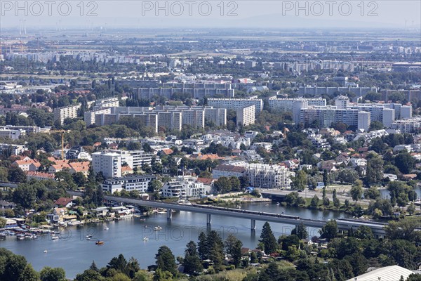 Panorama of a city with river, bridges and residential buildings, Vienna