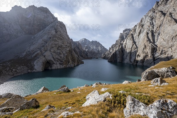 Mountain lake Kol Suu rocky steep mountains, Kol Suu Lake, Kurumduk Valley, Sary Beles Mountains,