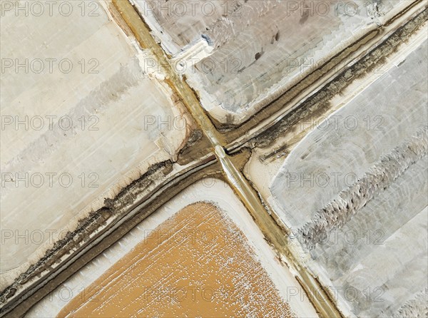 Saline ponds at the Bonanza salt works near Sanlúcar de Barrameda. The reddish colour depends on